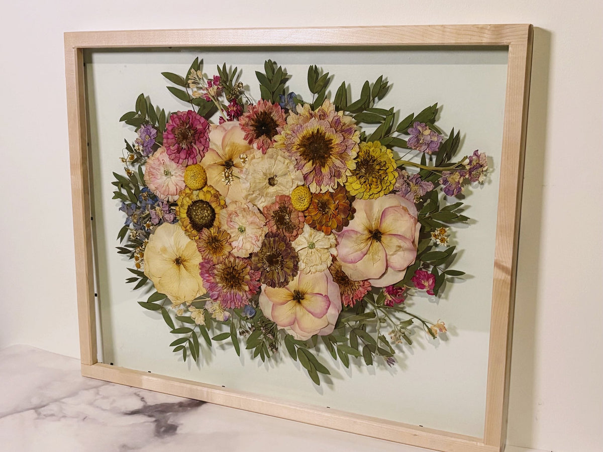 Pressed bouquet in a 16x20 wood frame